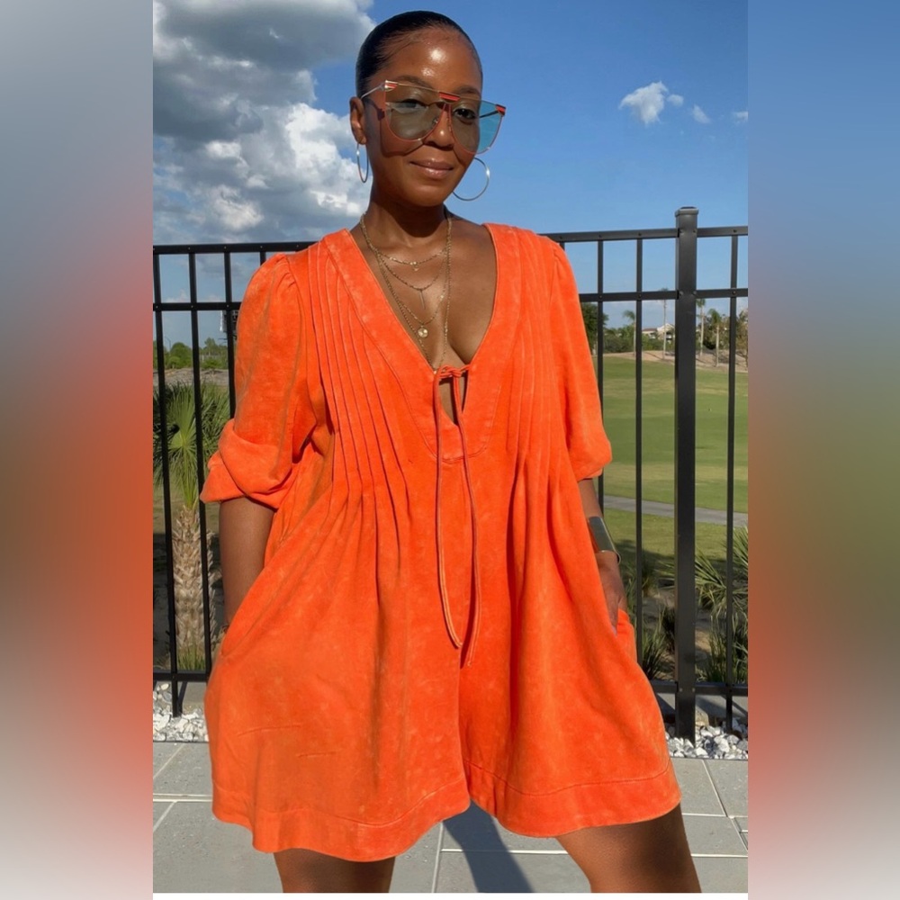 Vibrant deep v neck romper with pockets